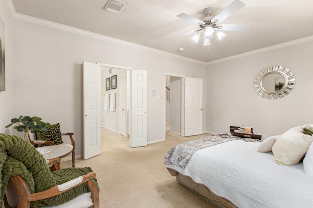 6811 S Trace Dr, Magnolia, TX 77354 - bedroom with crown molding, light colored carpet, baseboards, and visible vents
