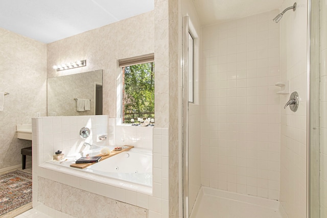 6811 S Trace Dr, Magnolia, TX 77354 - full bath featuring tile patterned flooring, a jetted tub, and a shower stall