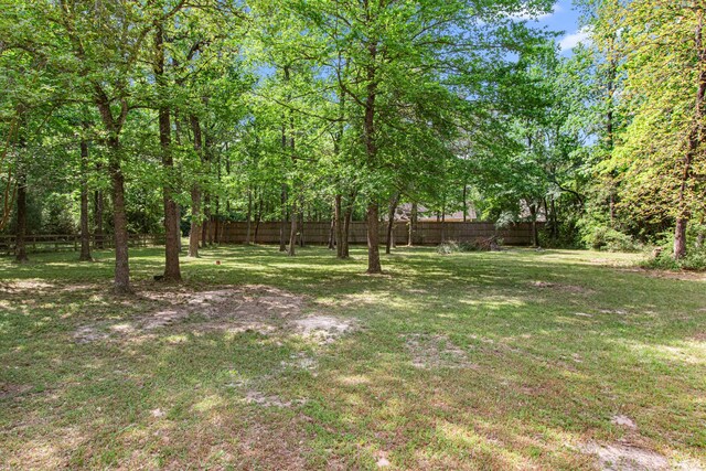 6811 S Trace Dr, Magnolia, TX 77354 - view of yard featuring fence