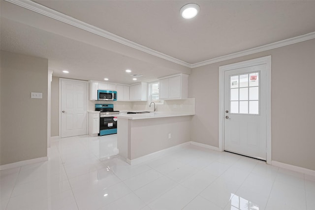 kitchen featuring stainless steel appliances, baseboards, white cabinetry, crown molding, and light countertops