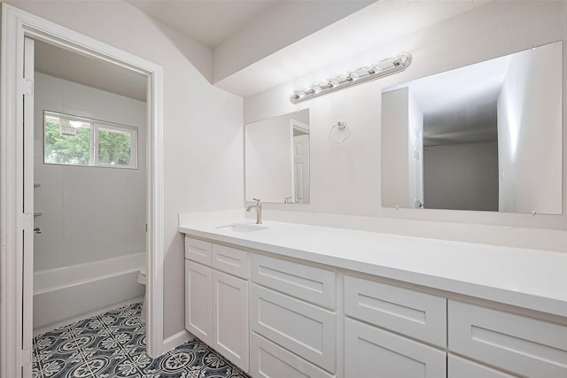 bathroom featuring vanity, toilet, and tile patterned flooring