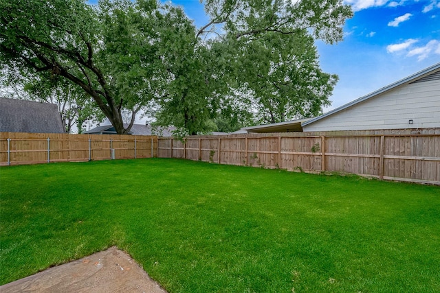 view of yard featuring a fenced backyard