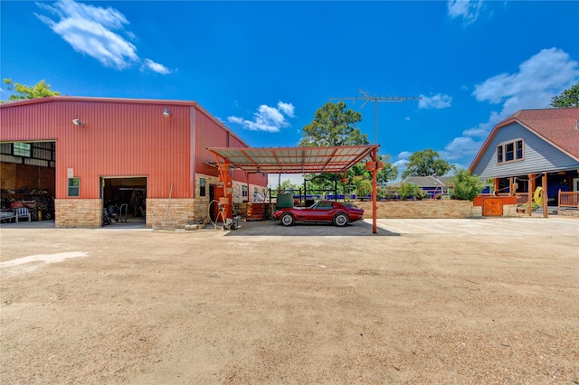 120 Rebecca St, Houston, TX 77022 - view of car parking featuring an outbuilding