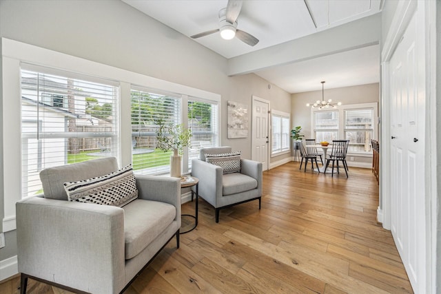 1411 Tulane St, Houston, TX 77008 - sitting room with a chandelier, ceiling fan, beam ceiling, light wood-style floors, and baseboards