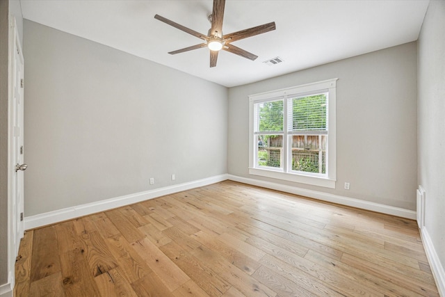 1411 Tulane St, Houston, TX 77008 - spare room with light wood-style floors, a ceiling fan, and baseboards