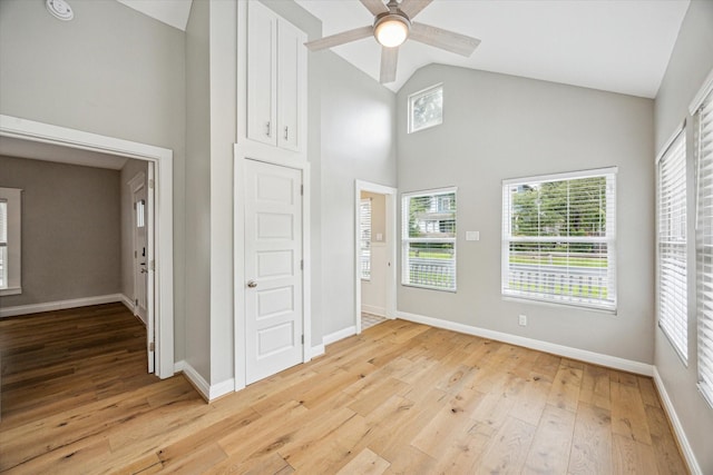 1411 Tulane St, Houston, TX 77008 - foyer featuring light wood-style flooring, healthy amount of natural light, high vaulted ceiling, ceiling fan, and baseboards