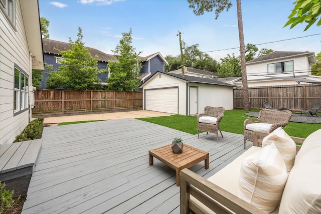 1411 Tulane St, Houston, TX 77008 - wooden terrace featuring a fenced backyard, an outdoor structure, and a garage