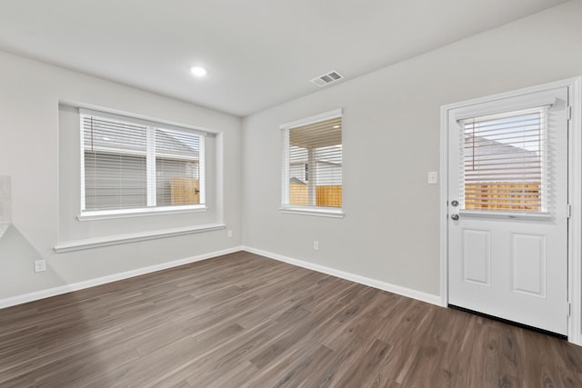 entryway featuring baseboards, recessed lighting, visible vents, and wood finished floors