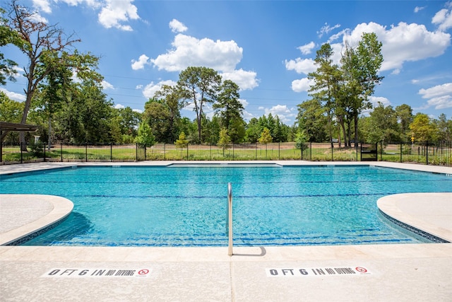 pool featuring fence