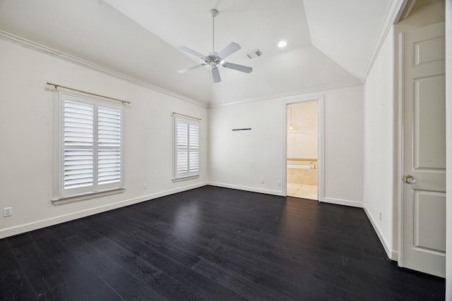 unfurnished bedroom featuring crown molding, visible vents, baseboards, dark wood-style flooring, and lofted ceiling