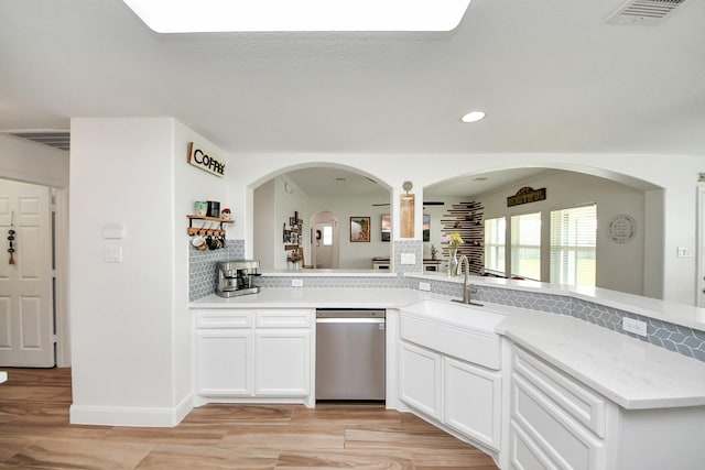 11202 Leah Elizabeth Dr, Needville, TX 77461 - bar with stainless steel dishwasher, tasteful backsplash, a sink, light wood-style flooring, and recessed lighting