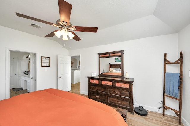 11202 Leah Elizabeth Dr, Needville, TX 77461 - bedroom featuring light wood-style flooring, vaulted ceiling, baseboards, ensuite bathroom, and a ceiling fan