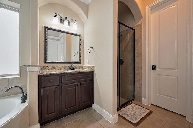 17019 Mahogany Trace Ln, Richmond, TX 77407 - full bathroom with tile patterned floors, vanity, a stall shower, and a bath
