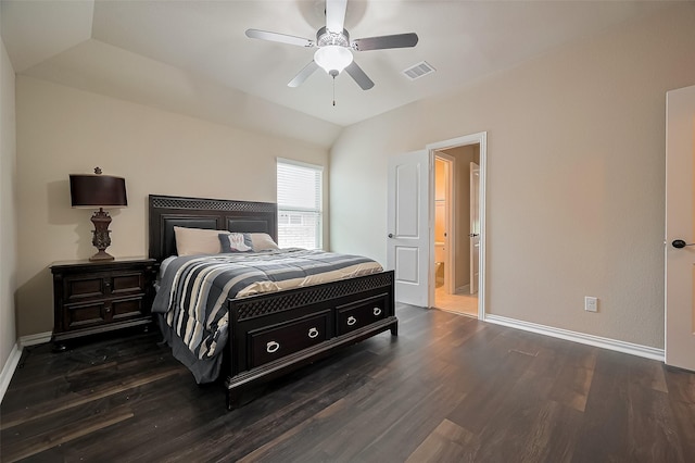 17019 Mahogany Trace Ln, Richmond, TX 77407 - bedroom with baseboards, ensuite bath, dark wood finished floors, visible vents, and vaulted ceiling