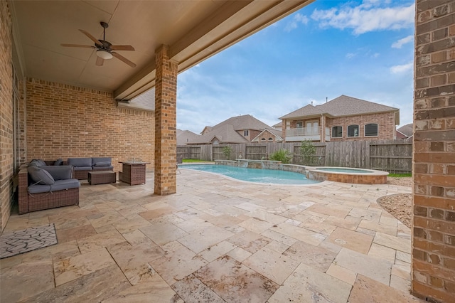 17019 Mahogany Trace Ln, Richmond, TX 77407 - view of swimming pool with a patio, ceiling fan, a pool with connected hot tub, an outdoor hangout area, and a fenced backyard