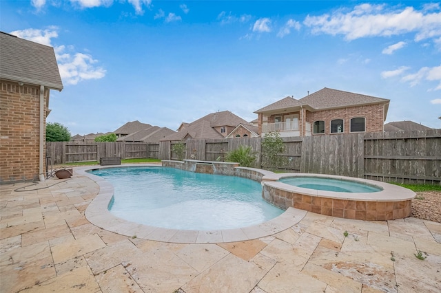 17019 Mahogany Trace Ln, Richmond, TX 77407 - view of swimming pool with a fenced backyard, a patio, a residential view, and a pool with connected hot tub