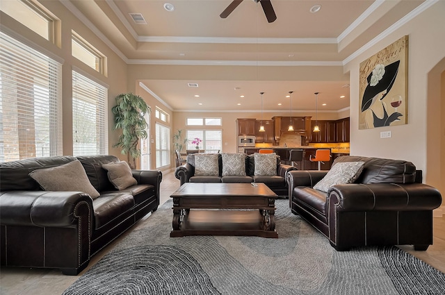 17019 Mahogany Trace Ln, Richmond, TX 77407 - living room featuring ceiling fan, ornamental molding, recessed lighting, and visible vents