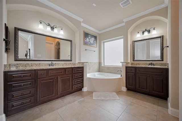 17019 Mahogany Trace Ln, Richmond, TX 77407 - full bath with ornamental molding, visible vents, a sink, a bath, and tile patterned floors
