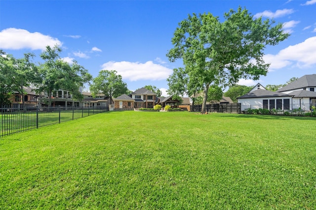 view of yard featuring fence