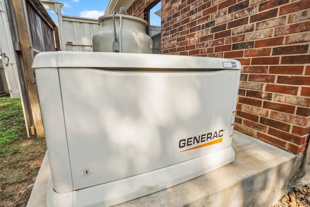 exterior details with brick siding and a power unit