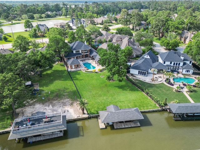aerial view with a water view and a residential view