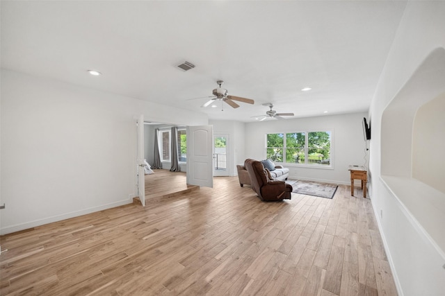 sitting room with light wood-type flooring, visible vents, ceiling fan, and recessed lighting
