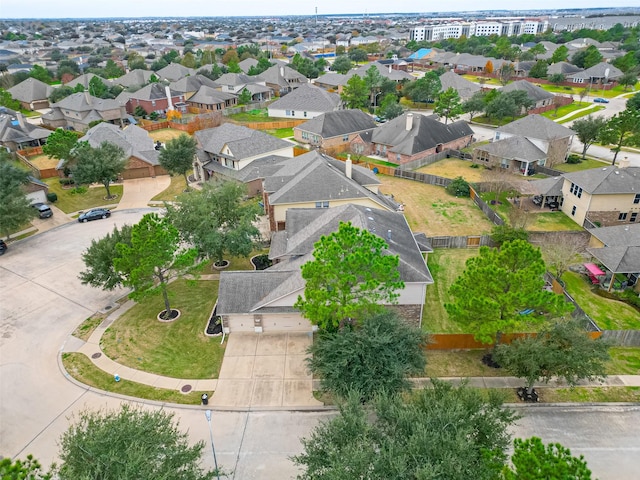 birds eye view of property with a residential view