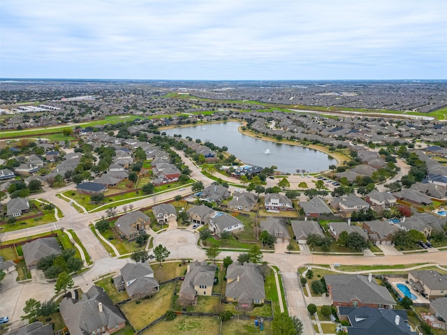 aerial view featuring a water view and a residential view