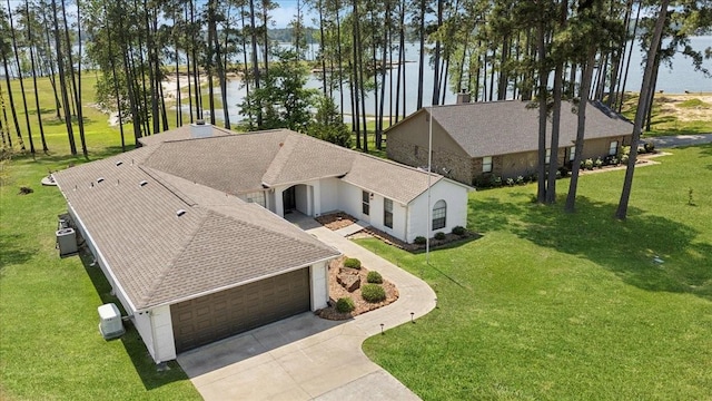 bird's eye view with a water view
