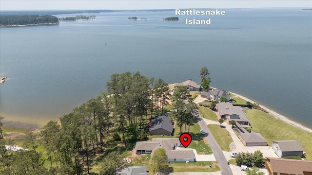 bird's eye view featuring a water view and a residential view