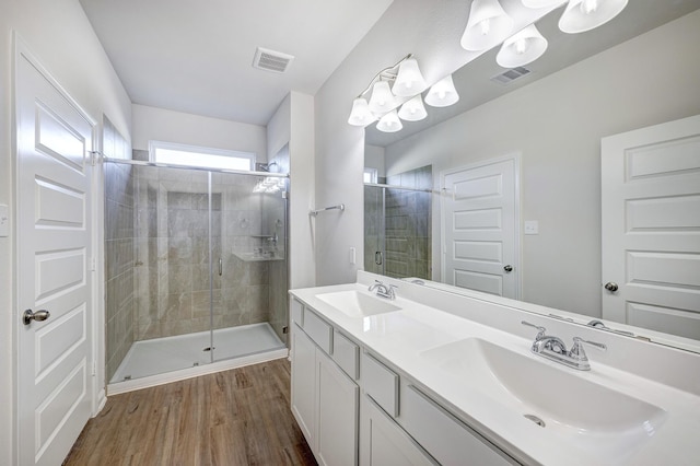805 Apple Blossom Dr, La Marque, TX 77568 - bathroom with visible vents, a shower stall, and a sink