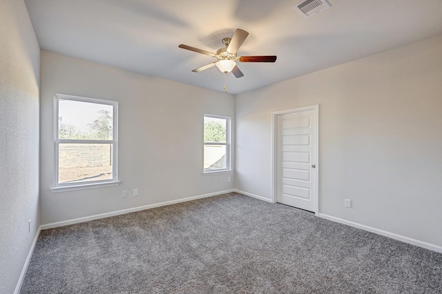 805 Apple Blossom Dr, La Marque, TX 77568 - spare room with visible vents, baseboards, ceiling fan, and carpet floors