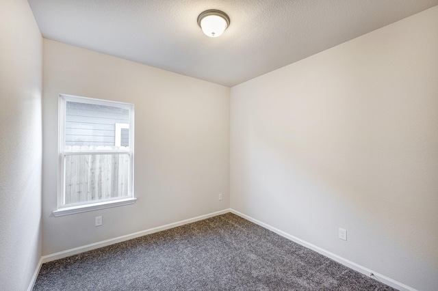 805 Apple Blossom Dr, La Marque, TX 77568 - unfurnished room featuring baseboards and carpet flooring