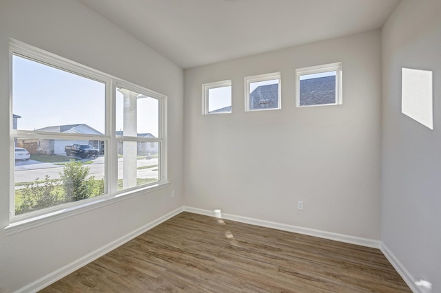 805 Apple Blossom Dr, La Marque, TX 77568 - empty room with wood finished floors and baseboards