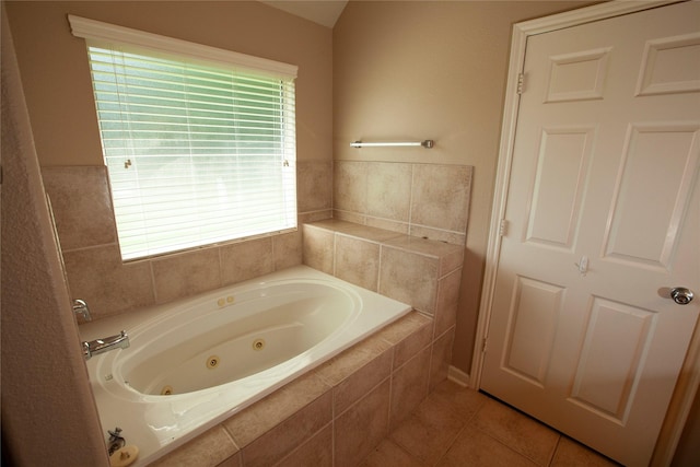 13847 Ventura Rd, Willis, TX 77318 - full bath featuring a jetted tub and tile patterned flooring