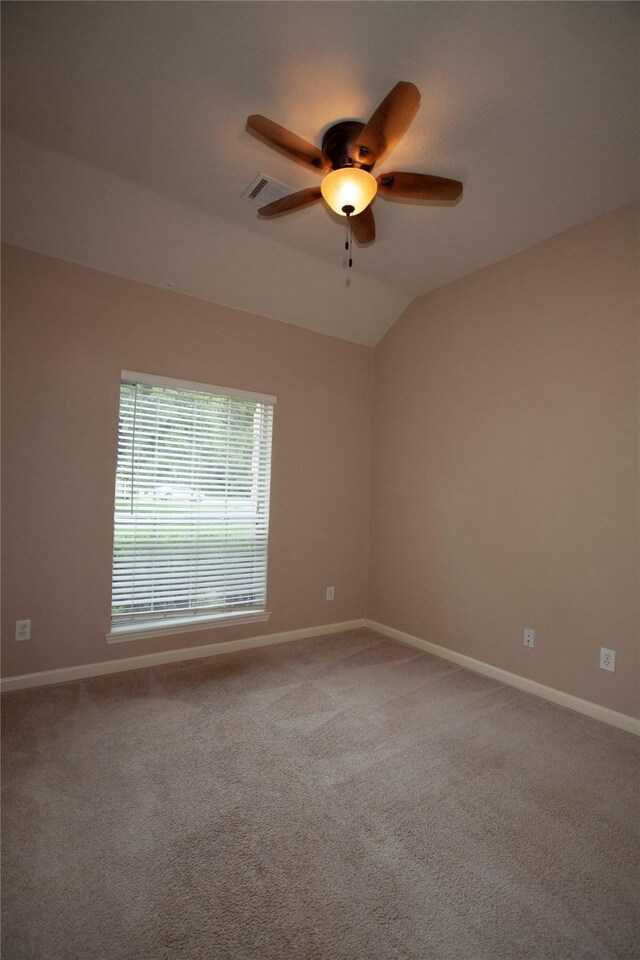 13847 Ventura Rd, Willis, TX 77318 - spare room featuring baseboards, ceiling fan, and carpet floors