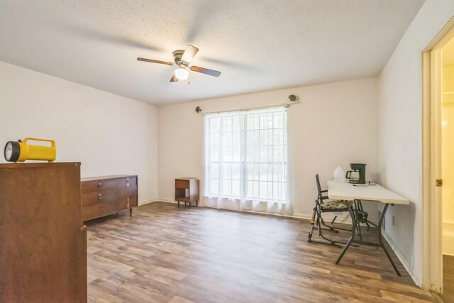 4308 Red Oak Dr, Nacogdoches, TX 75965 - office featuring ceiling fan, wood finished floors, and baseboards