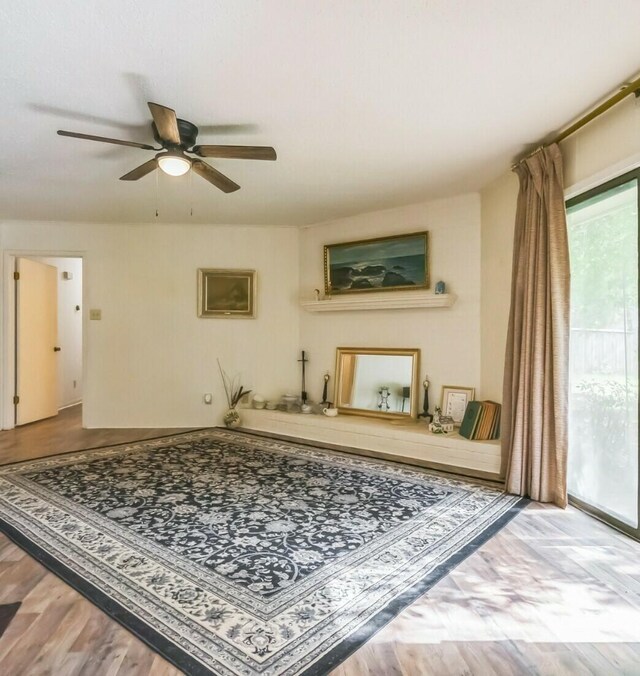 4308 Red Oak Dr, Nacogdoches, TX 75965 - living area with a ceiling fan and wood finished floors