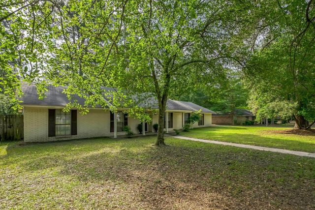 4308 Red Oak Dr, Nacogdoches, TX 75965 - view of front of house featuring brick siding and roof with shingles
