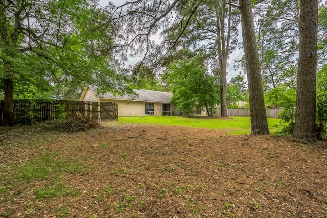 4308 Red Oak Dr, Nacogdoches, TX 75965 - view of yard with a fenced backyard