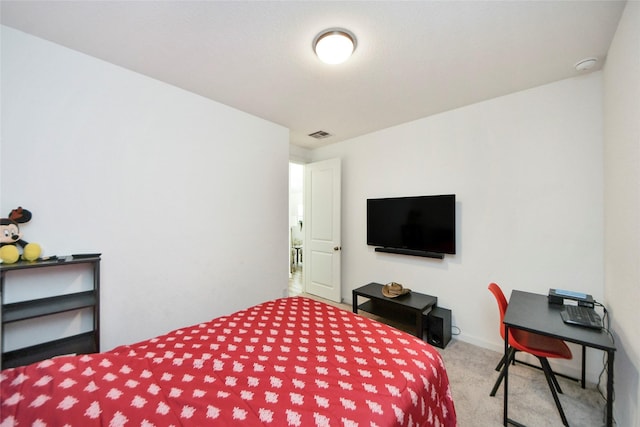 carpeted bedroom with visible vents