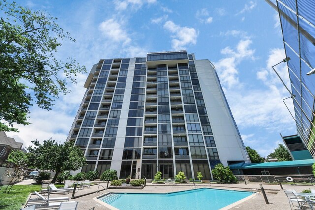 community pool featuring a patio area