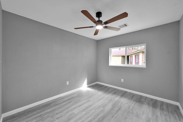 22603 Pebworth Pl, Spring, TX 77373 - spare room with ceiling fan, wood finished floors, and baseboards