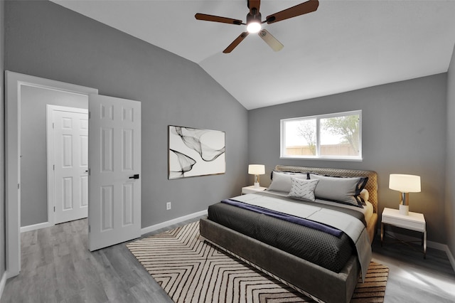 22603 Pebworth Pl, Spring, TX 77373 - bedroom featuring wood finished floors, lofted ceiling, baseboards, and ceiling fan
