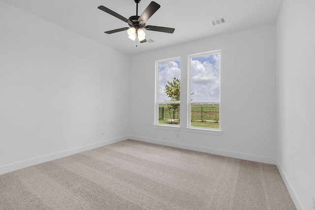 8251 Red Shiner Way, Fulshear, TX 77441 - unfurnished room with light colored carpet and a ceiling fan