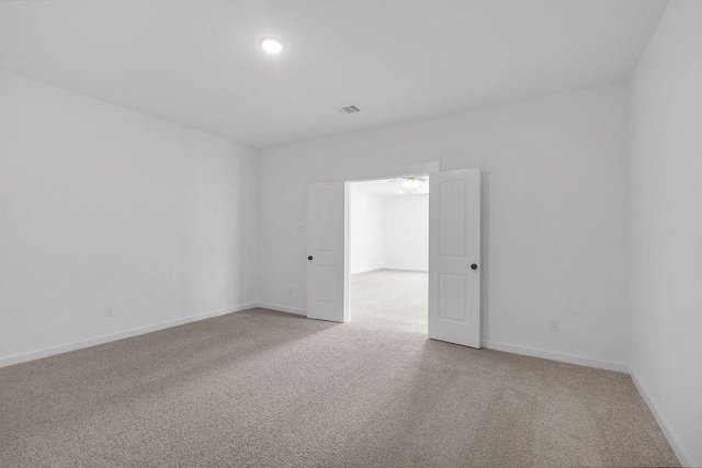 8251 Red Shiner Way, Fulshear, TX 77441 - spare room featuring carpet floors and recessed lighting