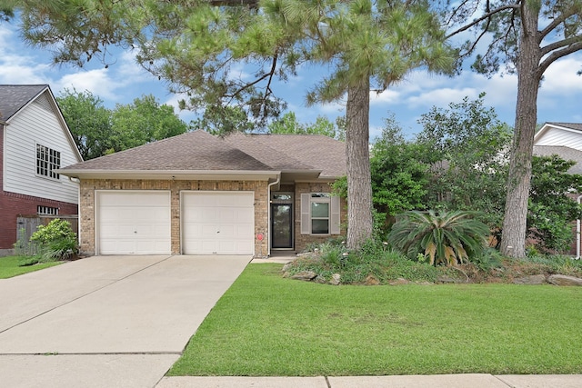 7551 Basswood Forest Ct, Houston, TX 77095 - view of front facade featuring a garage, concrete driveway, a front lawn, roof with shingles, and brick siding
