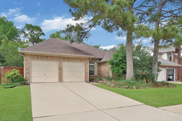 7551 Basswood Forest Ct, Houston, TX 77095 - view of front of house featuring a shingled roof, driveway, brick siding, and an attached garage