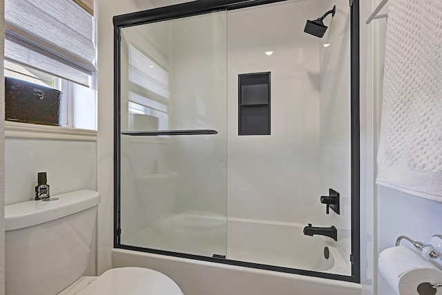 7551 Basswood Forest Ct, Houston, TX 77095 - bathroom featuring toilet and enclosed tub / shower combo