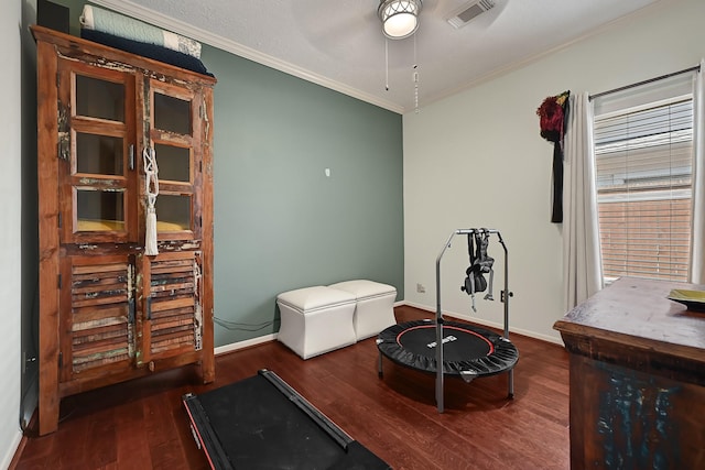 7551 Basswood Forest Ct, Houston, TX 77095 - workout area featuring a ceiling fan, crown molding, wood finished floors, and baseboards